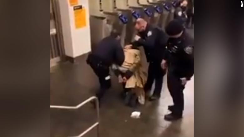 Video shows NYPD officer punching a suspect in the head